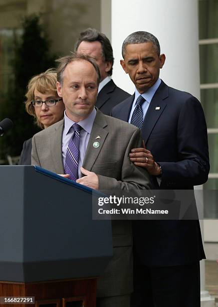 Father of Sandy Hook Elementary School shooting victim, Mark Barden introduces U.S. President Barack Obama as former U.S. Rep. Gabrielle Giffords...