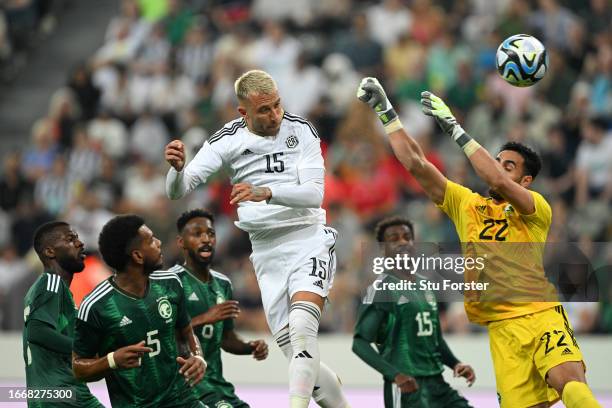 Francisco Calvo of Costa Rica scores the team's first goal past Nawaf Alaqidi of Saudi Arabia during the International Friendly match between Saudi...
