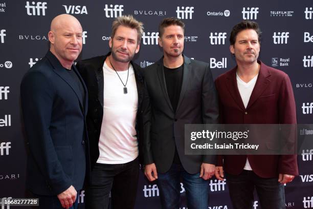 Mike Kroeger, Chad Kroeger, Daniel Adair and Ryan Peake of Nickelback attend the "Hate to Love: Nickelback" premiere at the 2023 Toronto...