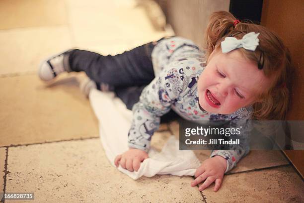 toddler tantrum on floor - tantrum stock pictures, royalty-free photos & images