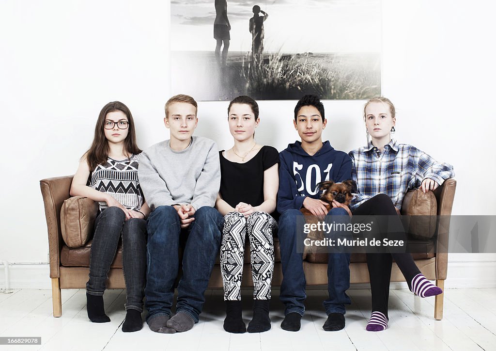 5 teenager and dog on sofa