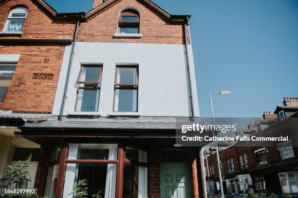 exterior view of a end terrace town house - legal documents stock pictures, royalty-free photos & images