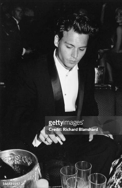 American actor Johnny Depp attends a party for the film 'Ed Wood', in which he plays the lead, at the Cannes Film Festival, France, May 1995.