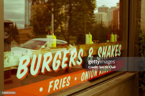 sign reading burgers & shakes on restaurant window - washington state sign stock pictures, royalty-free photos & images