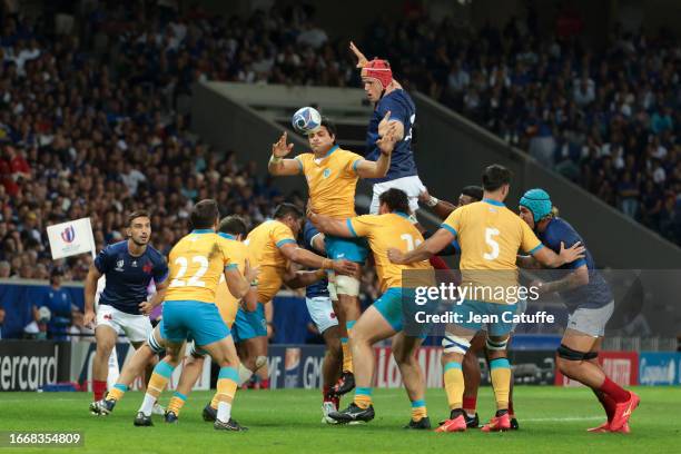 Lucas Bianchi of Uruguay, Thibaud Flament of France in action during the Rugby World Cup France 2023 match between France and Uruguay at Stade Pierre...