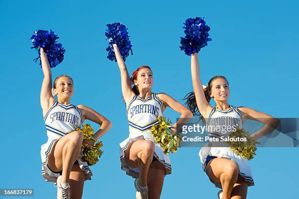 caucasian cheerleaders posing together - cheerleader ストックフォトと画像
