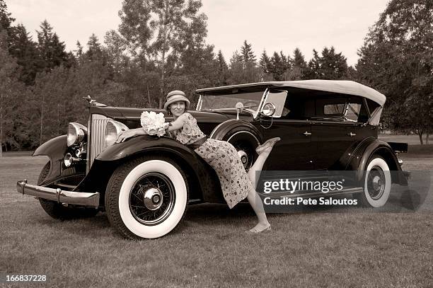 caucasian woman on vintage car - 1930s era stock pictures, royalty-free photos & images