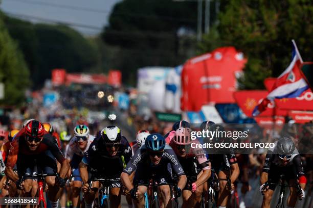 Team Dsm's Italian rider Alberto Dainese crosses the finish line first at the end of the stage 19 of the 2023 La Vuelta cycling tour of Spain, a...