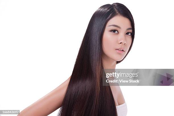 young lady and silky hair - shiny straight hair stock pictures, royalty-free photos & images