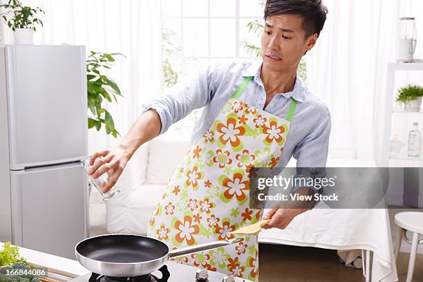 Scared Cooking 574 Man Scared In Kitchen Stock Photos, High-Res Pictures, and Images ...