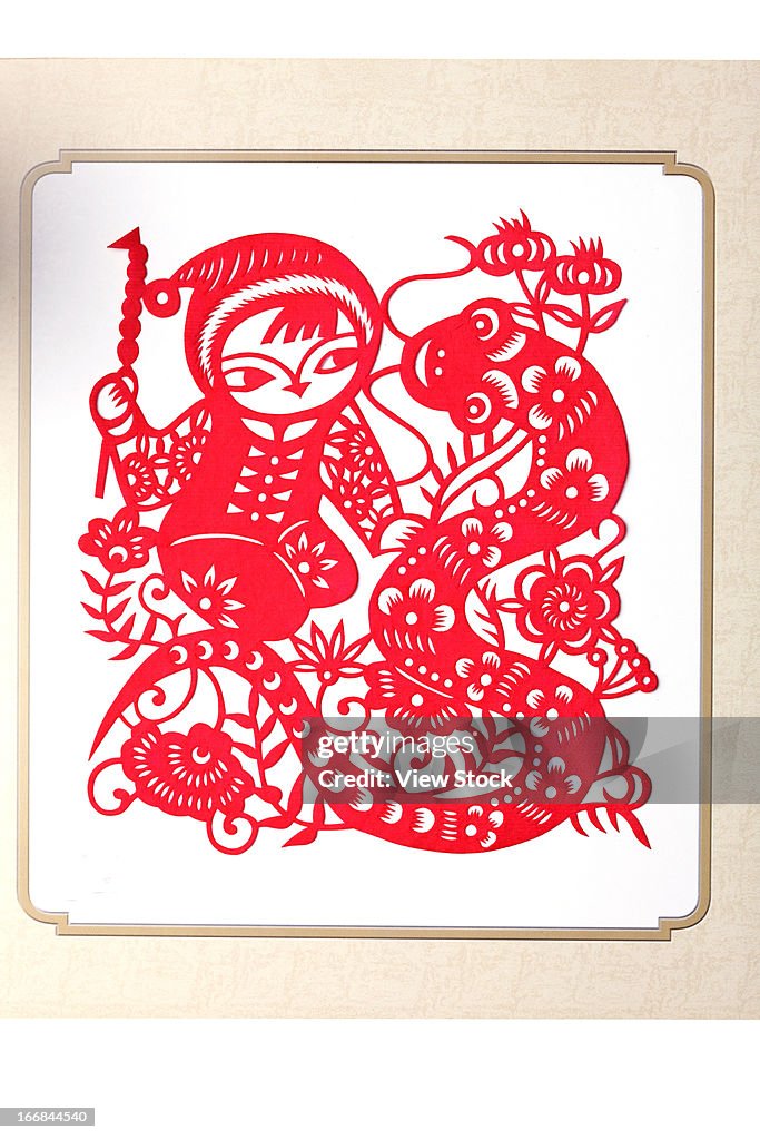 Paper-cutting of child and snake