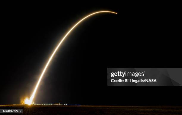 The Soyuz MS-24 rocket is seen in this 90-second exposure as it launches with Expedition 70 NASA astronaut Loral O'Hara, and Roscosmos cosmonauts...