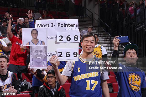 Fans anticipate Stephen Curry of the Golden State Warriors to break the record on three-pointers during the game between the Golden State Warriors...