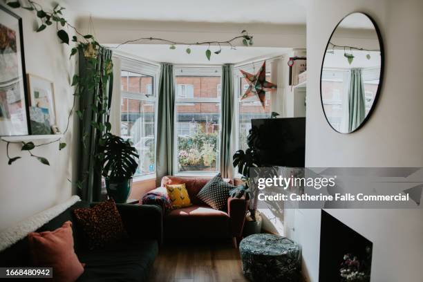 a stylish, tidy small living room - small stock pictures, royalty-free photos & images