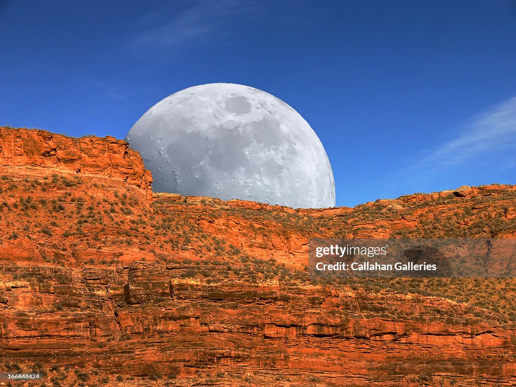 Moonrise Over A Red Rock Mesa