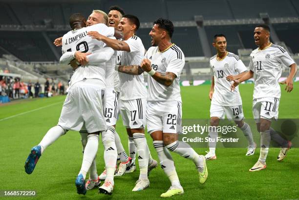 Francisco Calvo of Costa Rica celebrates after scoring the team's first goal during the International Friendly match between Saudi Arabia and Costa...