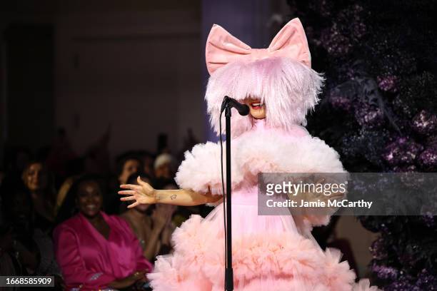 Sia performs on the runway during the Christian Siriano SS24 Runway Show at The Pierre Hotel on September 08, 2023 in New York City. (Photo by Jamie...