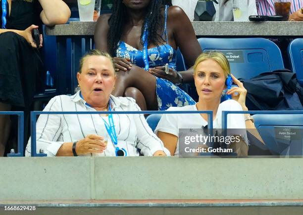 Gerda Jacoba Aletta Maritz and Charlize Theron are seen at the 2023 US Open Tennis Championships on September 08, 2023 in New York City.