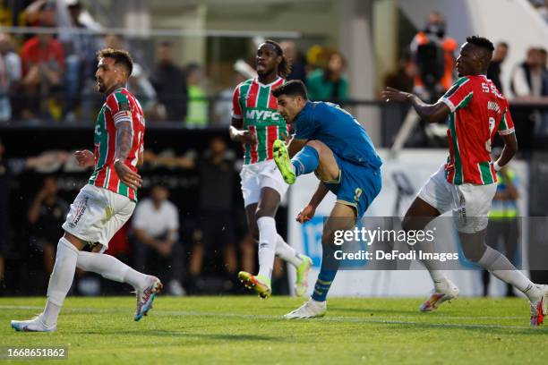 Mehdi Taremi of FC Porto scores his team's first goal during the Liga Portugal Bwin match between Estrela Amadora and FC Porto at Estadio Jose Gomes...