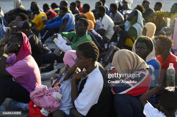 View of crowd outside of the hotspot as nearly 7,000 irregular migrants arrive in Lampedusa island of Italy on September 15, 2023. Located on the...