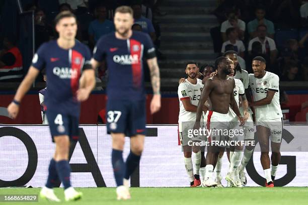 Nice's Nigerian forward Terem Moffi celebrates scoring his team's third goal during the French L1 football match between Paris Saint-Germain and OGC...