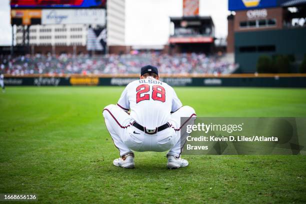 Matt Olson of the Atlanta Braves stretches on the field before the game against the Los Angeles Angels at Truist Park on August 02, 2023 in Atlanta,...