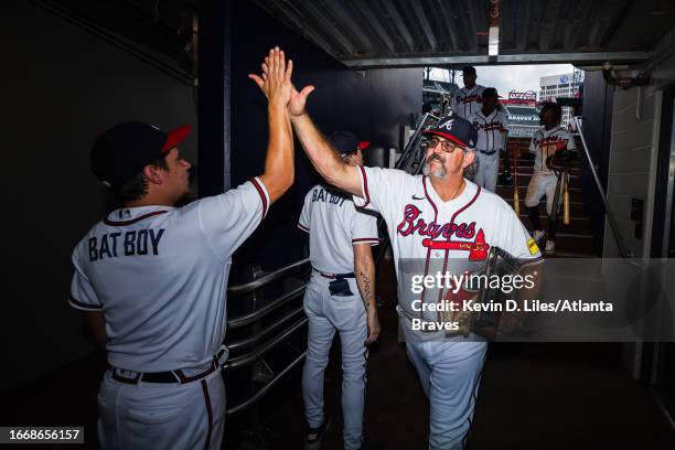 Sal Fasano of the Atlanta Braves celebrates the win over the Los Angeles Angels at Truist Park on August 02, 2023 in Atlanta, Georgia.