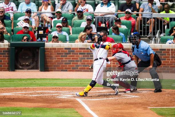 Ronald Acuna Jr. #13 of the Atlanta Braves hits a home run during the game against the Los Angeles Angels at Truist Park on August 02, 2023 in...