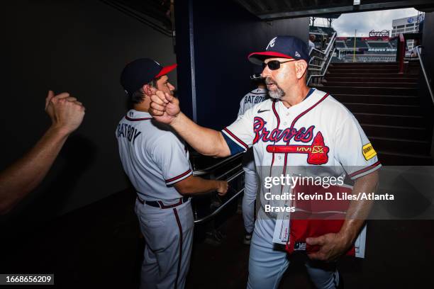 Walt Weiss of the Atlanta Braves celebrates the win over the Los Angeles Angels at Truist Park on August 02, 2023 in Atlanta, Georgia.