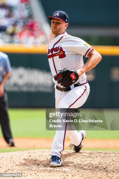 Michael Tonkin of the Atlanta Braves pitches during the game against the Los Angeles Angels at Truist Park on August 02, 2023 in Atlanta, Georgia.