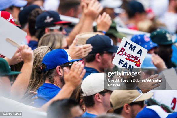 Atlanta Braves fans cheer during the game against the Los Angeles Angels at Truist Park on August 02, 2023 in Atlanta, Georgia.