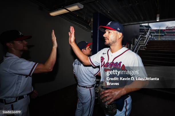 Brad Hand of the Atlanta Braves celebrates the win over the Los Angeles Angels at Truist Park on August 02, 2023 in Atlanta, Georgia.