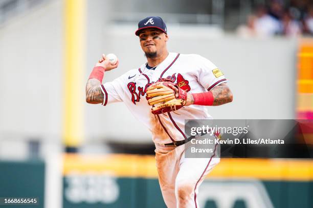 Orlando Arcia of the Atlanta Braves makes a throw to first during the game against the Los Angeles Angels at Truist Park on August 02, 2023 in...