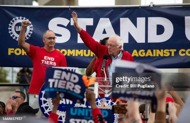 Sen Bernie Sanders and UAW President Shawn Fain speak at a rally in support of United Auto Workers members as they strike the Big Three auto makers...