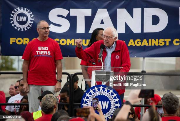 Sen Bernie Sanders and UAW President Shawn Fain speak at a rally in support of United Auto Workers members as they strike the Big Three auto makers...