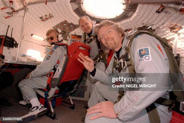 This 18 December 1998 file photo shows Per Lindstrand, Steve Fossett and Virgin CEO Richard Branson, who hold numerous ballooning records between...