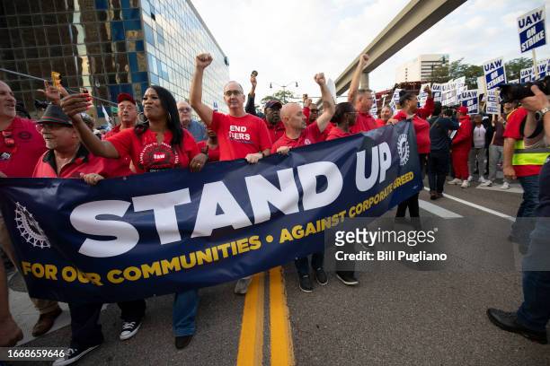 President Shawn Fain marches with UAW members through downtown Detroit after a rally in support of United Auto Workers members as they strike the Big...