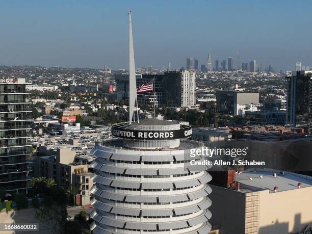 Hollywood, CA Aerial drone view of the iconic and historic Capitol Records Building in Hollywood and the downtown Los Angeles skyline Wednesday,...