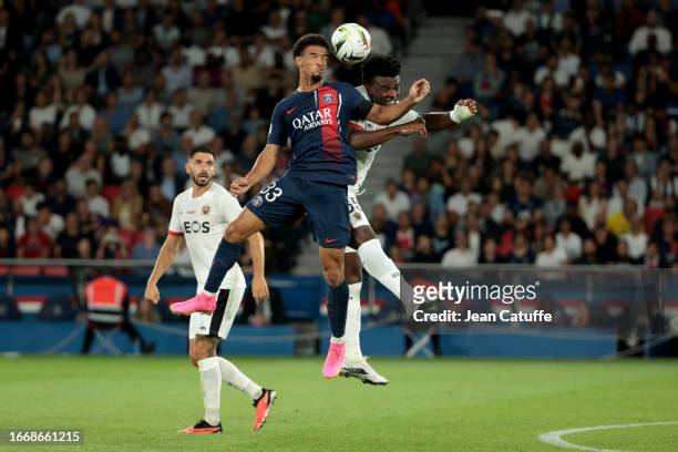 Warren Zaire-Emery of PSG, Youssouf Ndayishimiye of Nice in action during the Ligue 1 Uber Eats match between Paris Saint-Germain and OGC Nice at...