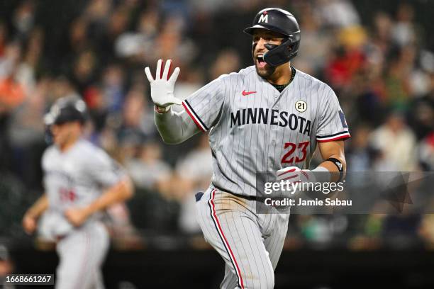 Royce Lewis of the Minnesota Twins celebrates after hitting a grand-slam home run in the second inning against the Chicago White Sox at Guaranteed...