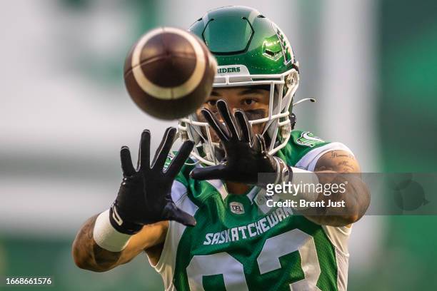 Jerreth Sterns of the Saskatchewan Roughriders catches a ball in warmup before the game between the Edmonton Elks and Saskatchewan Roughriders at...
