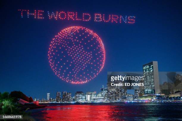 Light display created using drones is performed before the city skyline and United Nations headquarters as part of a campaign to raise awareness...