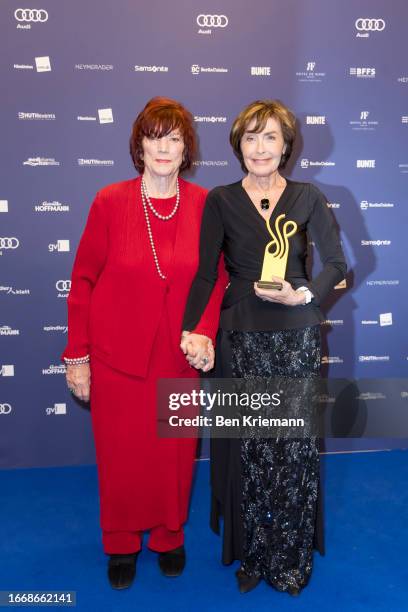 Regina Ziegler stands next to Thekla Carola Wied who won the award for the category "Ehrenpreis Lebenswerk" at the Deutscher Schauspielpreis 2023 at...