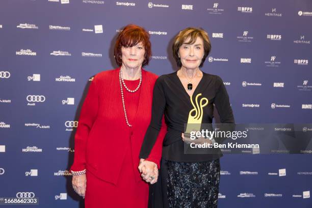 Regina Ziegler stands next to Thekla Carola Wied who won the award for the category "Ehrenpreis Lebenswerk" at the Deutscher Schauspielpreis 2023 at...