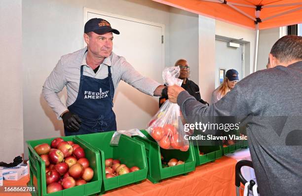 Liev Schreiber attends Feeding America hosts Hunger Action Day event at Food Bank for New York City's Harlem Community Kitchen on September 15, 2023...