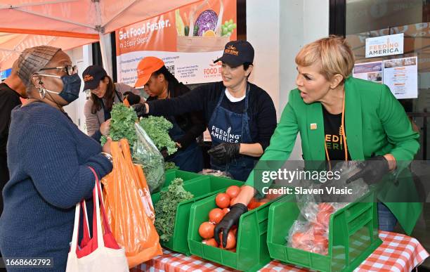 Bridget Moynahan, Phoebe Robinson, Ellie Krieger and Claire Babineaux-Fontenot attend Feeding America hosts Hunger Action Day event at Food Bank for...