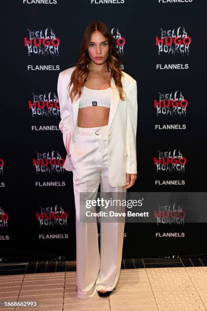 Hana Cross attends the launch event of HUGO x Bella Poarch's collection at Flannels X on September 15, 2023 in London, England.