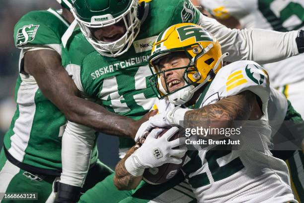 Shannon Brooks of the Edmonton Elks runs with the ball in the first half of the game between the Edmonton Elks and Saskatchewan Roughriders at Mosaic...