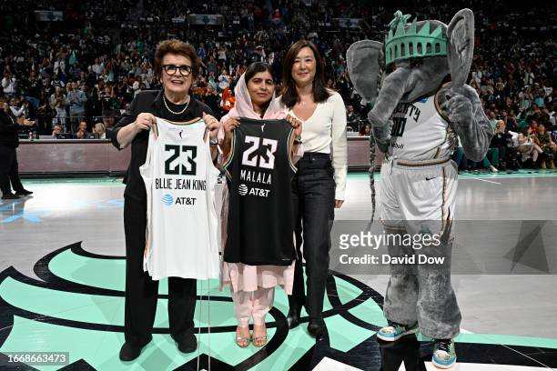 Billie Jean King and Malala Yousafzai are honored during the game between the Washington Mystics and New York Liberty during round one game one of...