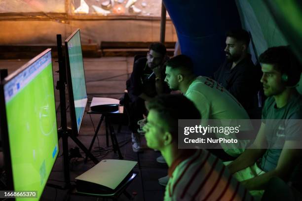 Iranian gamers compete during Iran's FIFA 23 Esports competitions, at Adrenaline Park in northwestern Tehran, September 15, 2023. Sixty-four Iranian...